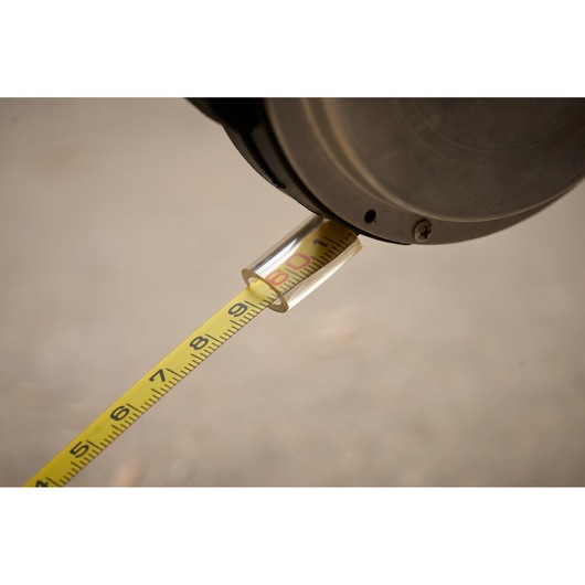 STANLEY 0-34-203 yellow tape measure close-up showing measurement markings.
