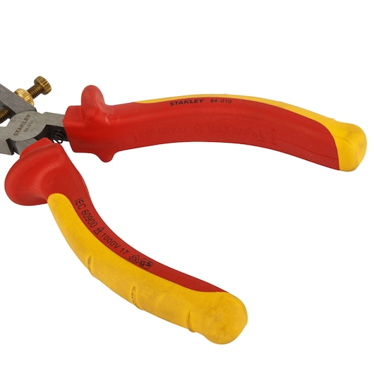 STANLEY 0-84-010 insulated pliers with red and yellow handles, side angle on white background.