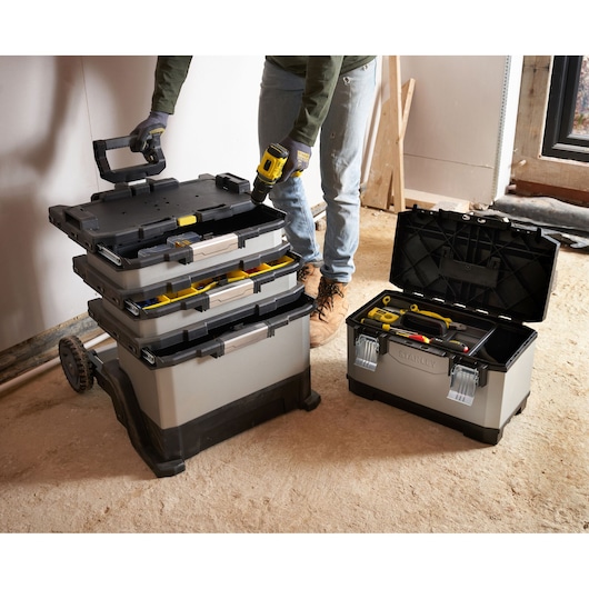 STANLEY 1-95-622 tool box set and open tool box with tools, photography of worksite floor.