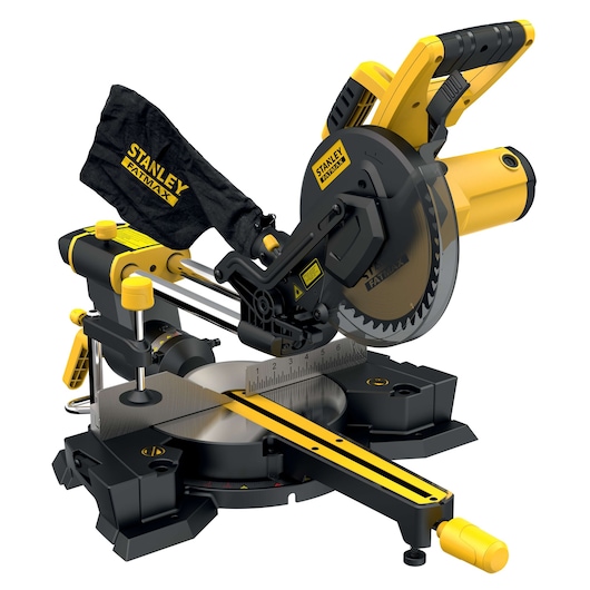 STANLEY FME721 miter saw with yellow and black design, dust bag, and angle guide on white background, side angle.