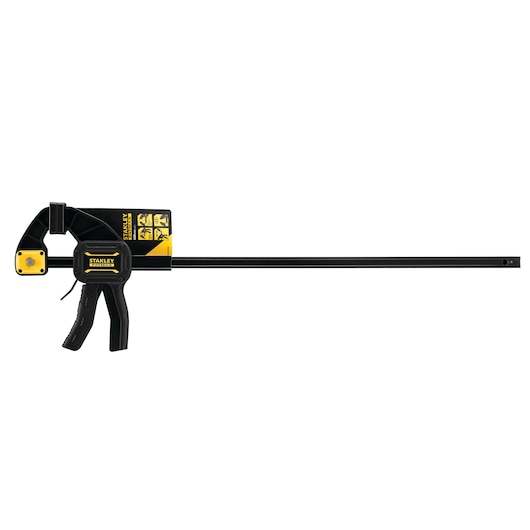 Stanley FMHT0-83236 photography of black and yellow trigger clamp, side angle on white background.