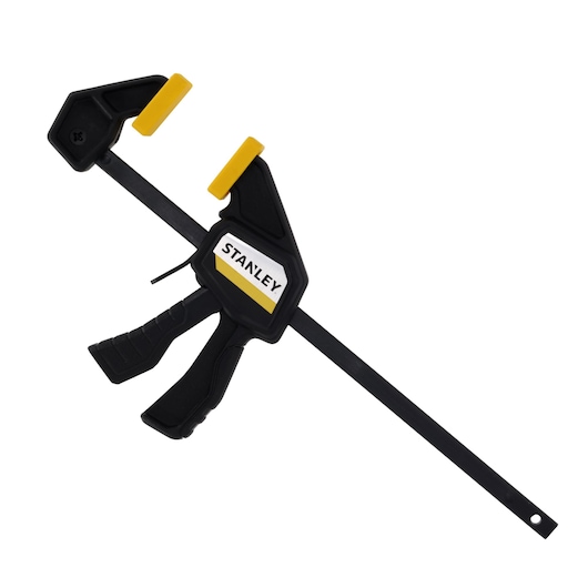 Photo of STANLEY FMHT83270-0 black and yellow quick grip bar clamp, side angle on white background.