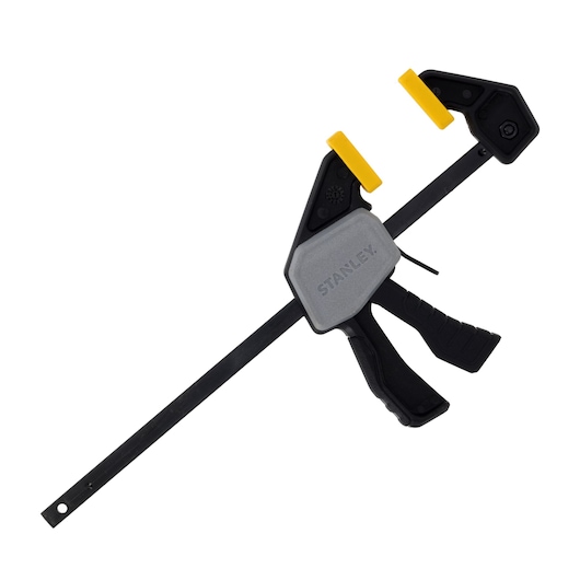 Photo of STANLEY FMHT83270-0 quick change bar clamp with black and yellow accents, side view on white background.