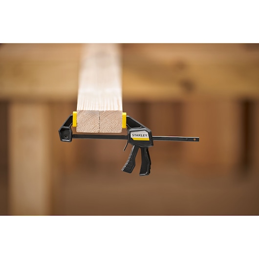 STANLEY FMHT83270-0 bar clamp holding wood, photography front angle.