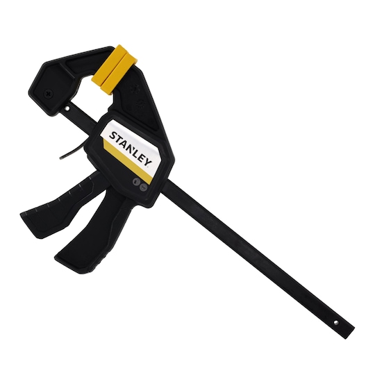 STANLEY FMHT83271-0 quick-grip clamp in black and yellow, side angle, photo on white background.