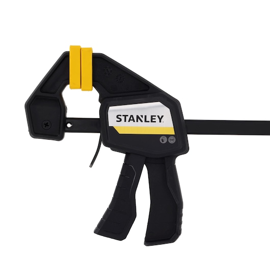 STANLEY FMHT83271-0 trigger clamp, black and yellow, side angle, photography product image.
