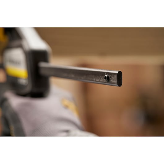 Photo of STANLEY FMHT83272-0 bar clamp in use, close-up of metal bar with focus on detail.