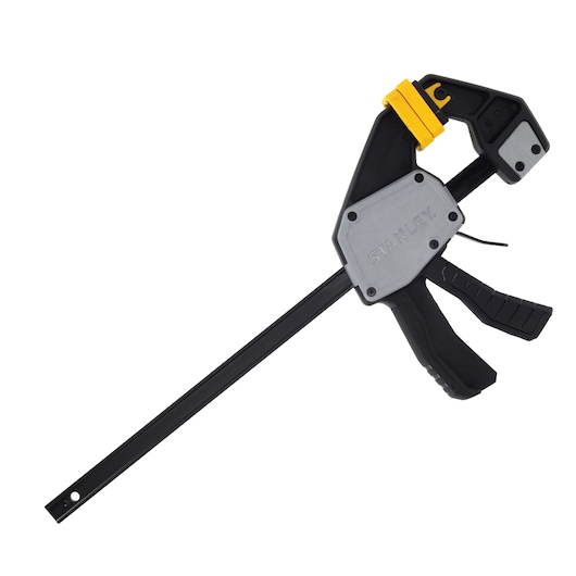 Stanley FMHT83274-0 bar clamp with black, yellow, and silver design, side angle on white background.