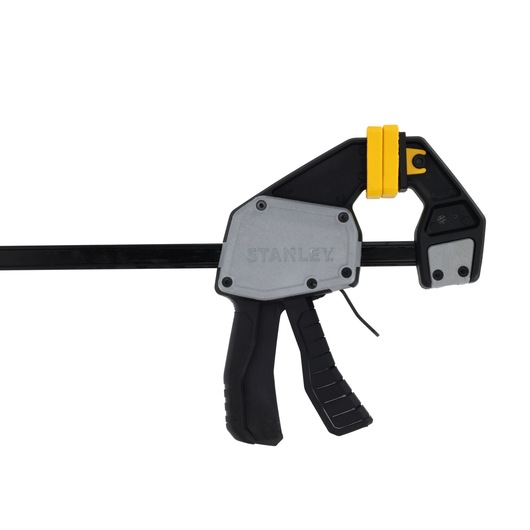STANLEY FMHT83276-0 trigger clamp with black and silver body, yellow pad, flat angle photo.