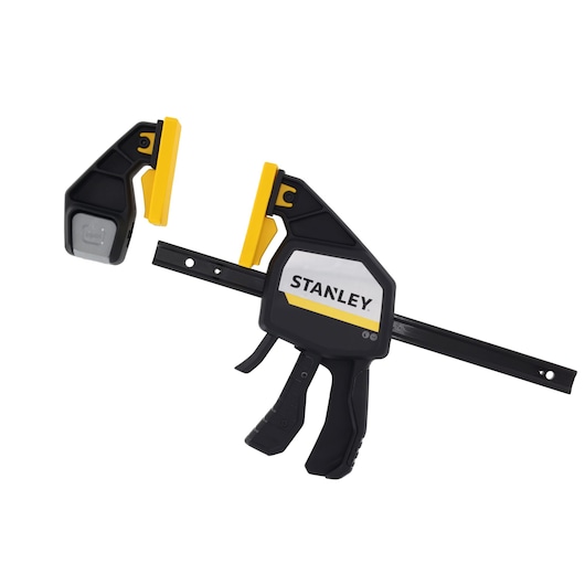 STANLEY FMHT83278-0 bar clamp with black and yellow body and removable jaw, right side view on white background.