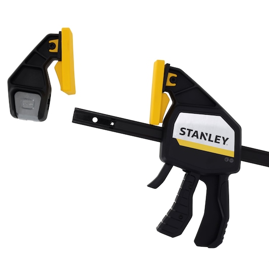 STANLEY FMHT83280-0 photography of black and yellow trigger clamp with removable jaw, side angle.