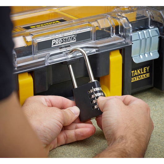 Stanley FMST1-71970 black combination padlock on Pro-Stack toolbox, close-up angle.