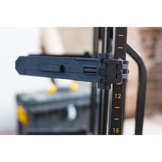 STANLEY FMST1-75684 black plastic arm with yellow measurement markings, close-up side view.