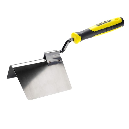 Stanley hand tool with yellow and black handle and angled metal blade for construction or masonry tasks.