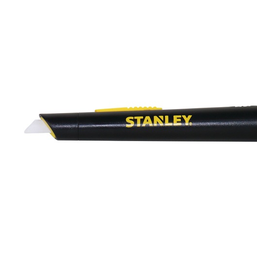 Stanley black and yellow utility knife with ceramic blade, partially extended, shown in close-up side view.