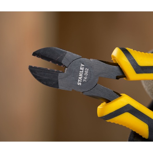 STANLEY STHT0-74362 diagonal cutting pliers with yellow and black grip, close-up photography.