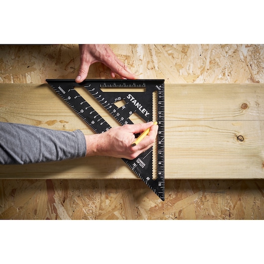 Stanley STHT46105-0 photography showing a black triangular carpenter’s square used for marking on wood.